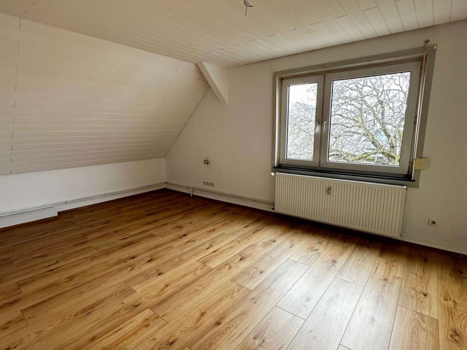 Wohnzimmer DG Maisonettewohnung Weisel