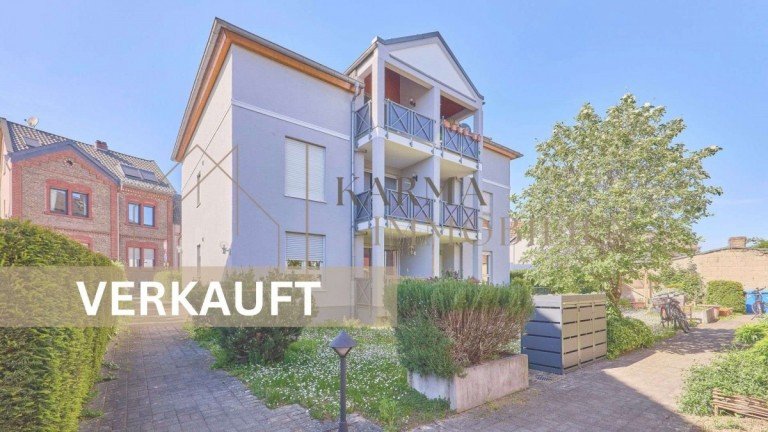 Hausansicht Oestrich-Winkel Etagenwohnung *** VERKAUFT *** Helle 2-Zimmer Wohnung mit Balkon, TG-Stellplatz und Gestaltungspotenzial