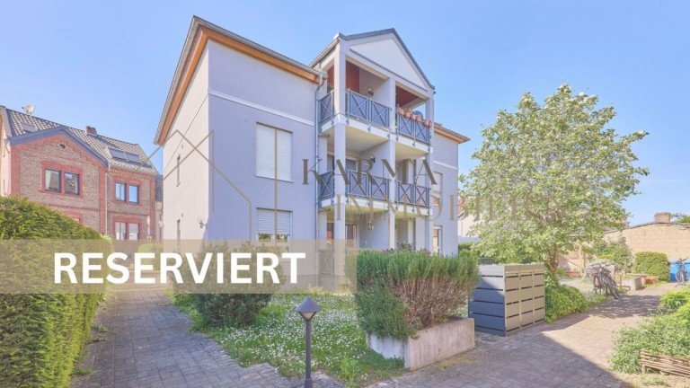 Hausansicht Oestrich-Winkel Etagenwohnung Helle 2-Zimmer Wohnung mit Balkon, TG-Stellplatz und Gestaltungspotenzial